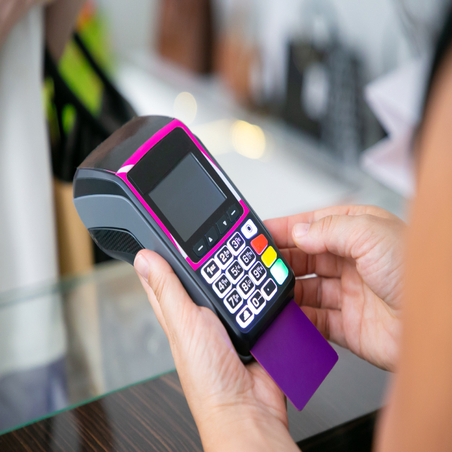 A customer paying by card on a Smile Payments terminal